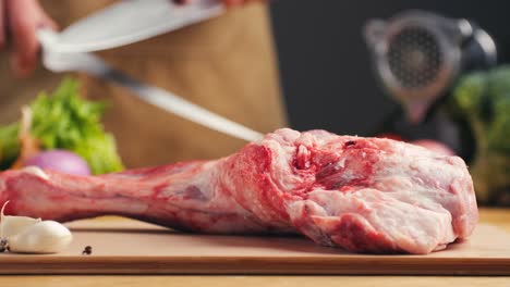 preparing raw lamb leg