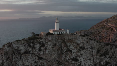 sunrise drone shot over the lighthouse of cap formentor, mallorca