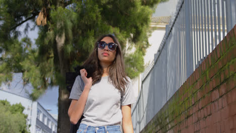 beautiful woman walking in the street 4k