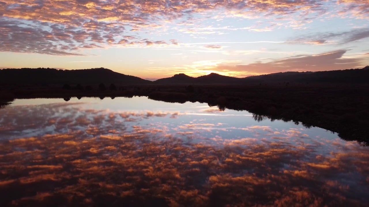 Aerial view of a beautiful sunrise in a lake in Calahorra, Spain