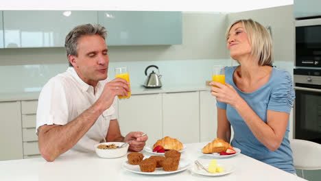 mature couple enjoying a romantic breakfast together