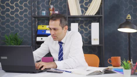 Businessman-finishing-his-work-and-relaxing.