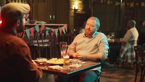 Bearded-Men-Drinking-Beer-In-Pub