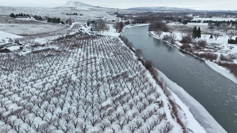 farm land covered in a layer of snow