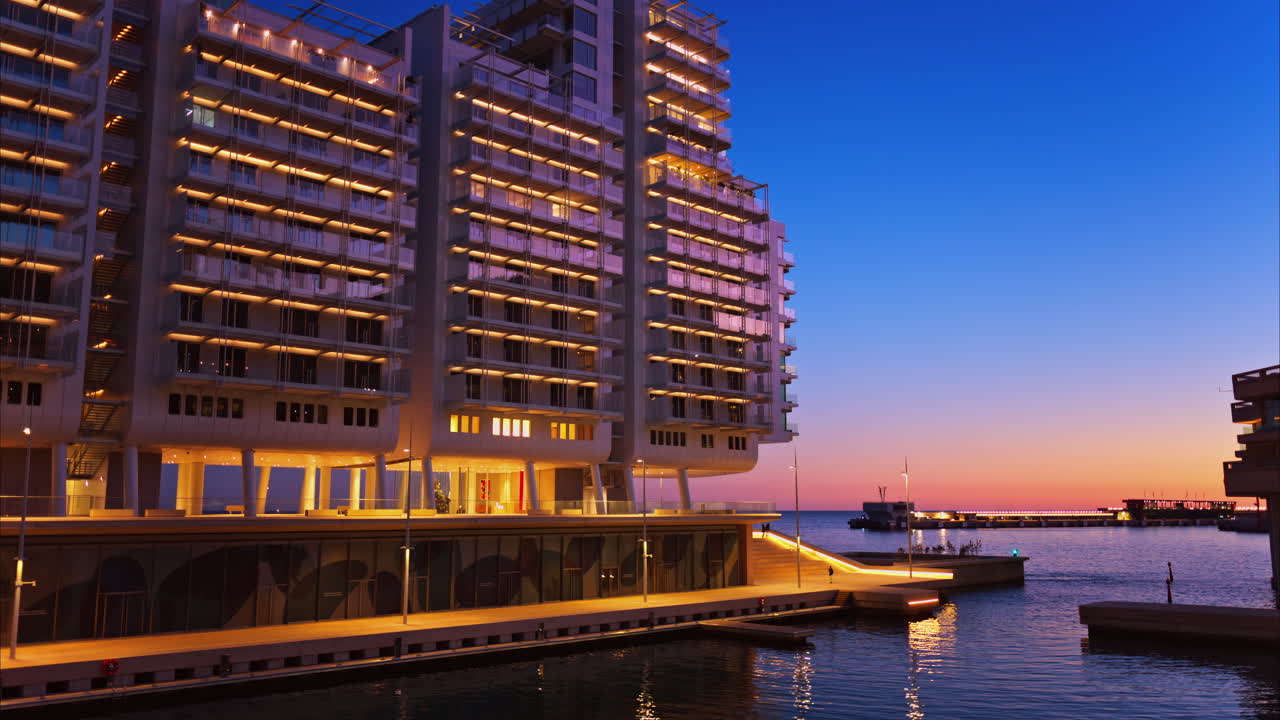 Buildings in Mareterra new Residential district in Monaco in the evening