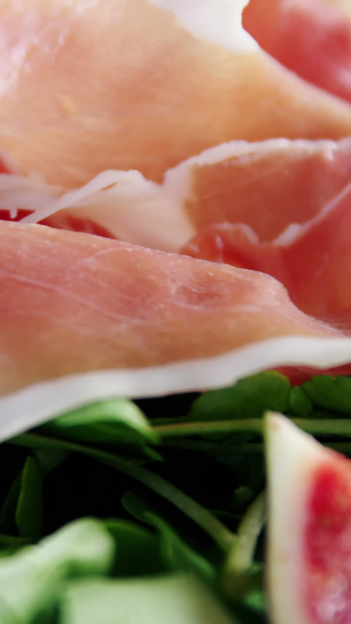 Raw meat and vegetables on plate