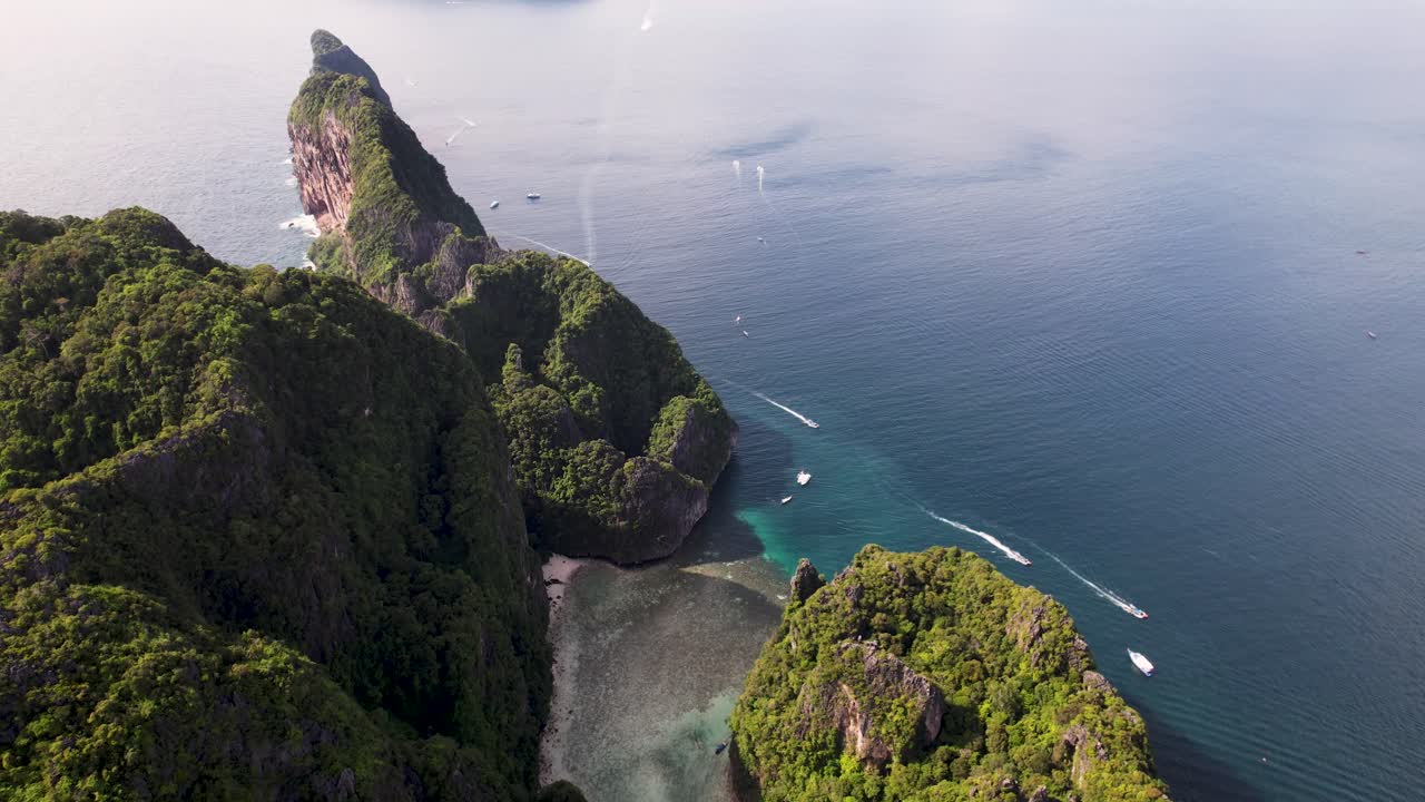 Koh Phi Phi Lee panoramic aerial of Maya Bay and Phi Leh Bay with turquoise water during the low tide. High quality 4k footage