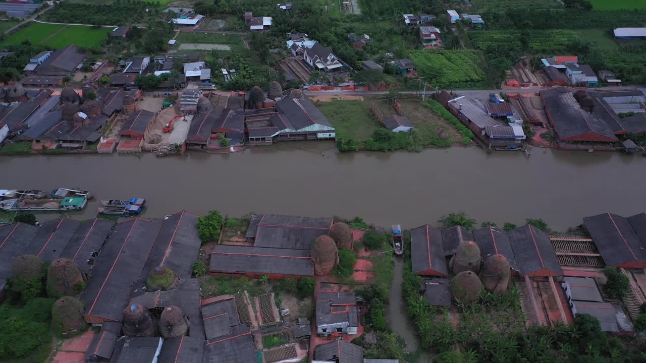 Aerial view of brick kilns and canal in Vinh Long in the Mekong Delta, Vietnam