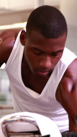 fit man working out on the exercise bike