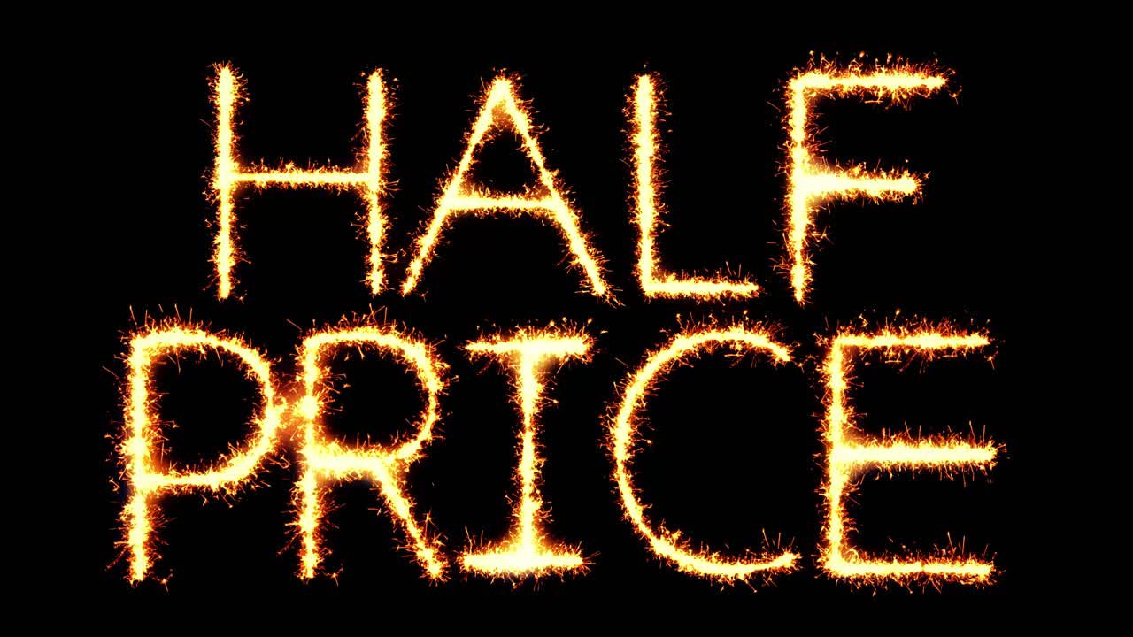 Half prices text sparkler writing with glitter sparks particles firework on black 4k loop background