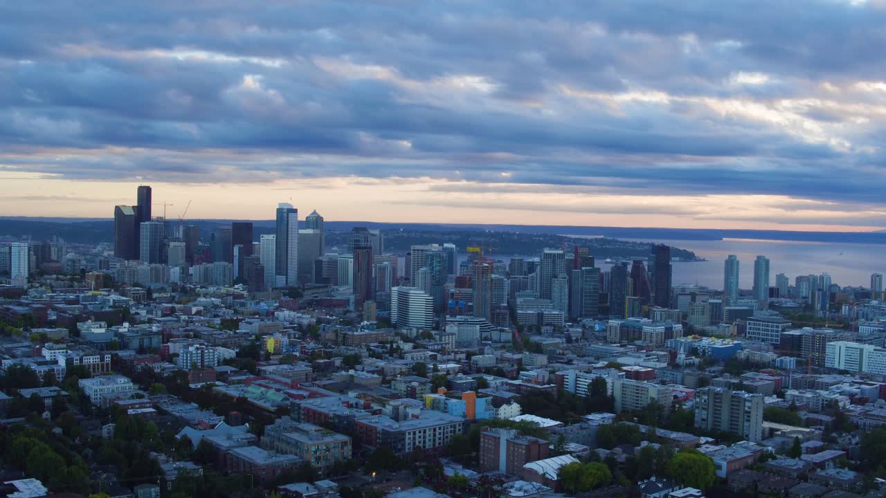 Aerial pulling away from Seattle's developing skyscrapers, circa 2016.
