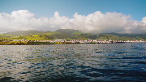 Picturesque-view-from-the-boat-of-the-beautiful-local-town-of-Vila-Franco-Do-Campo,-Sao-Miguel-island,-Azores---Portugal