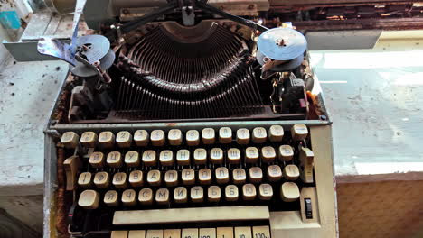 A-vintage-typewriter-sits-on-a-desk-by-a-window-in-Ventspils-International-Radio-Astronomy-Center