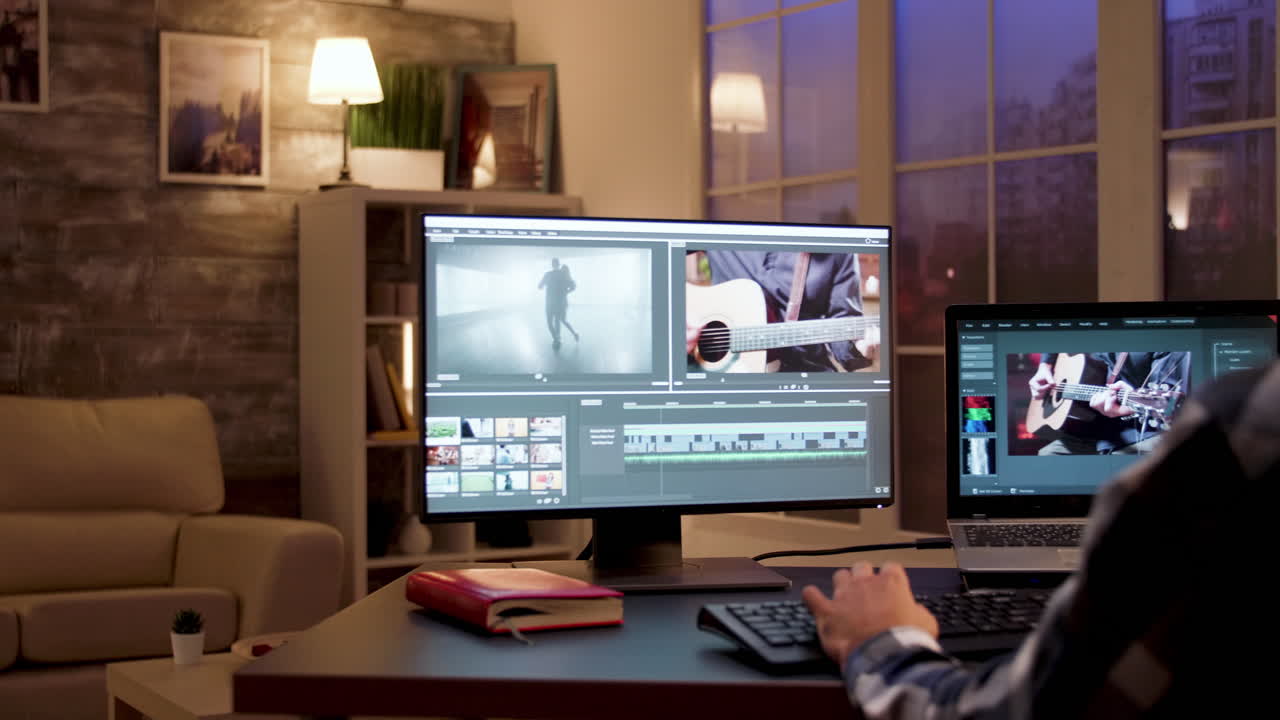 Man editing a video on his computer