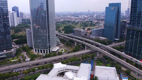 Flying-Above-Malaysian-Embassy-Near-City-Towers-In-Kuningan-City,-Jakarta,-Indonesia