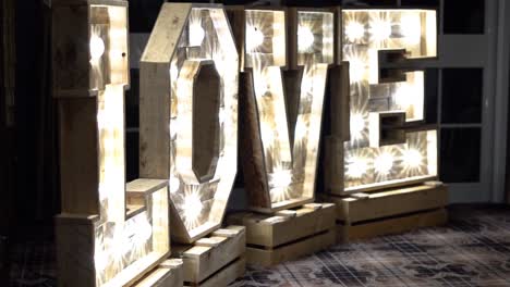 wedding letters with white lights spelling the word love as decoration