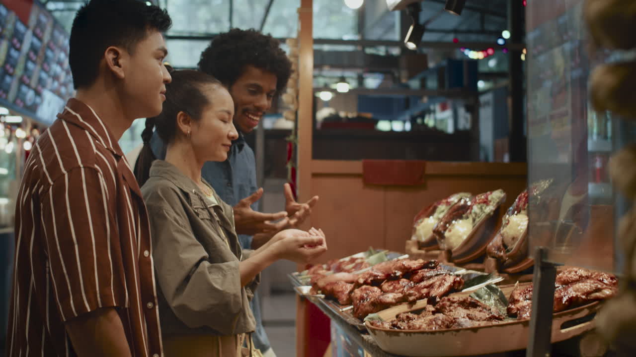 Multicultural Friends Buying Street Food at Local Market