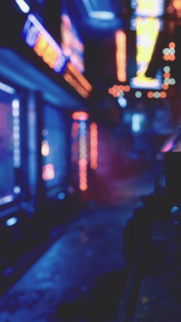 Night scene in urban alley with colorful neon lights in the dark