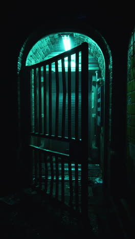 a creepy green-lit passageway