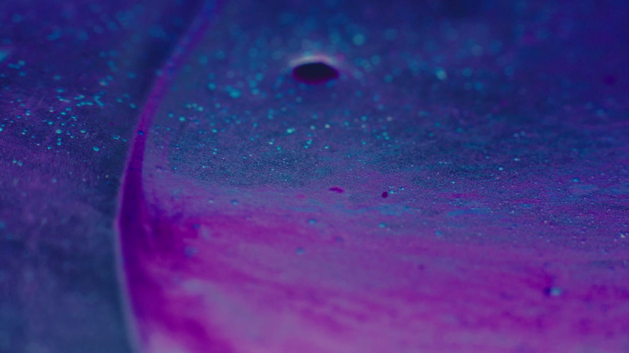 Colourful, organic, liquids macro shots buzzing and flowing