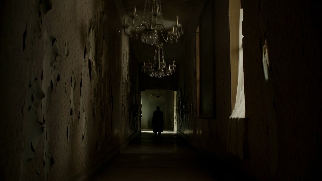 Dark Corridor With Chandelier And Silhouette, Urban Explorer Moves Toward Distant Doorway, Peeling Wallpaper