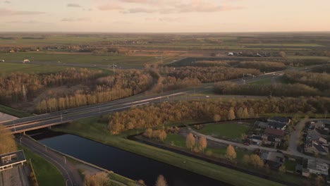 highway intersection in dutch countryside at sunset/sunrise