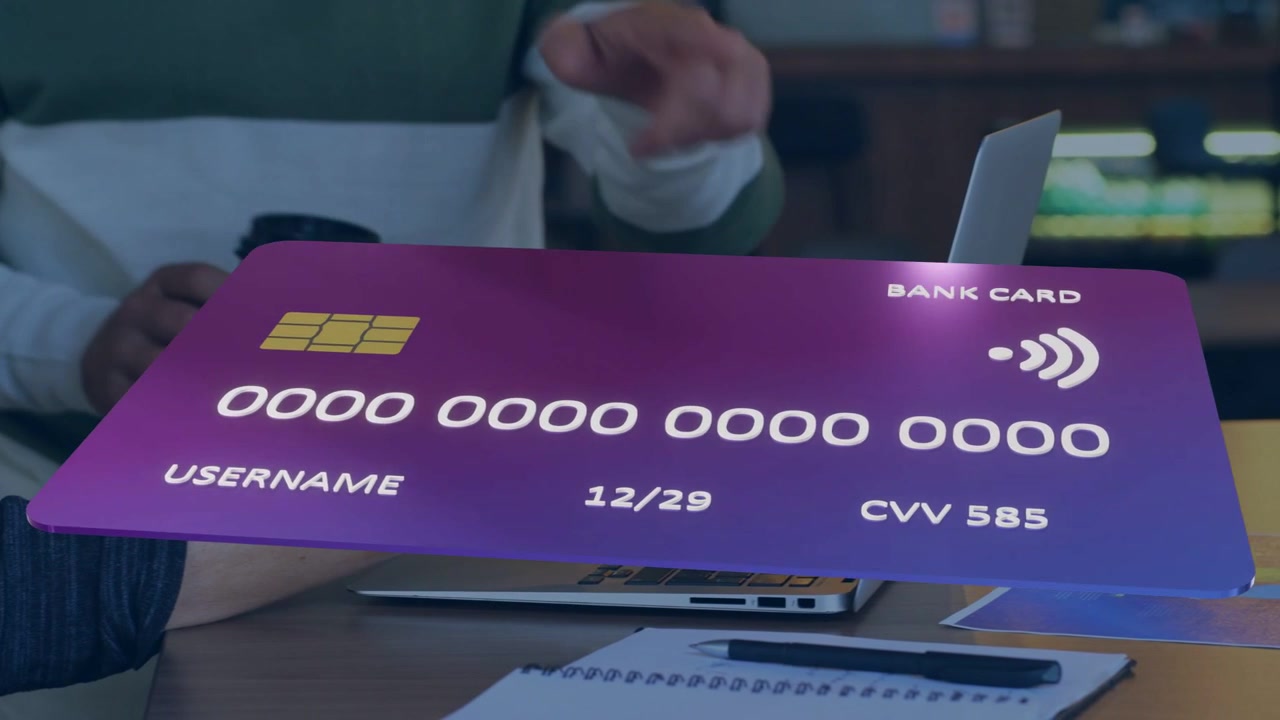 Pair tapping pad pointing purple card hologram rotating closer showing chip exp 12 or 29 for finance