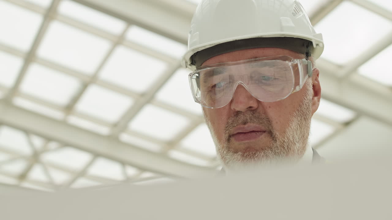 Reflection of Draft in Goggles of Man