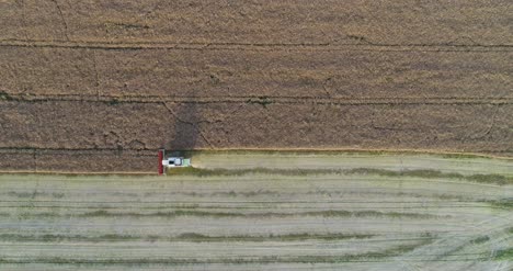 Machinery-Harvesting-Crops-On-Field-6