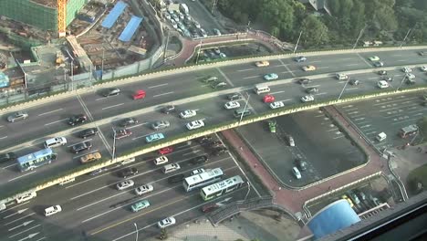 overhead picture of sped up traffic on an overpass in shanghai china