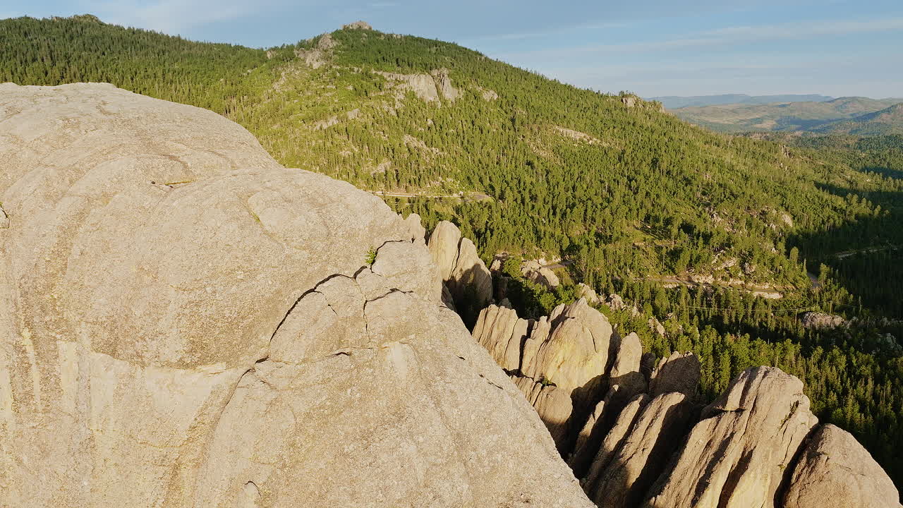 Sweeping aerial view of dramatic geological formations in the western United States.