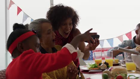 Multi-generation family having celebration meal