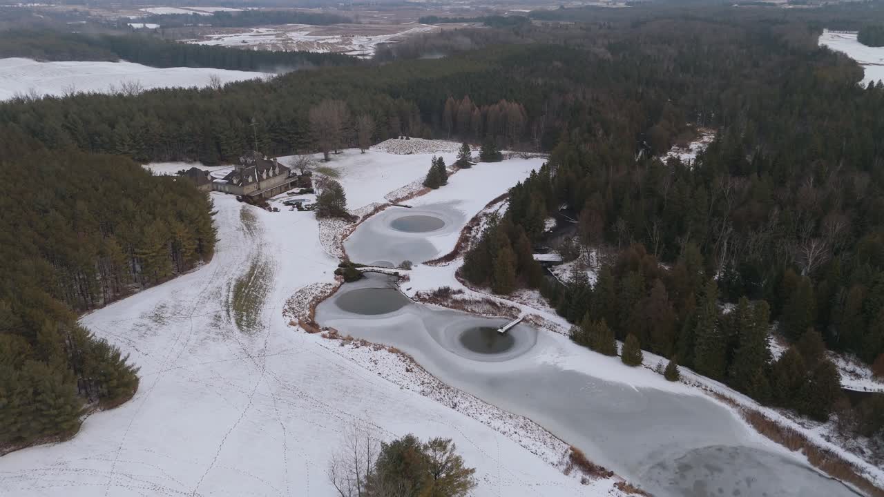 Establishing drone shot of luxury estate and Private Trout Fishing Club in Alton, Caledon, Ontario, Canada