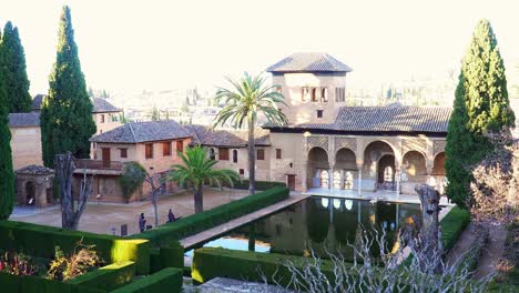 epic view of the alhambra of granada palace in spain under sunny day