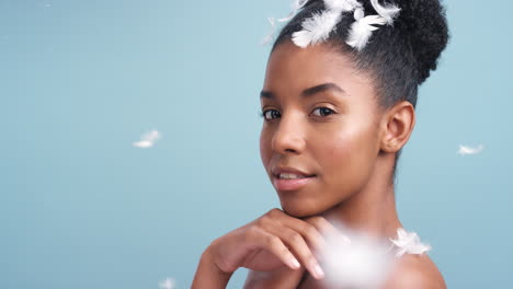 soft skin, feathers and black woman with a sensual