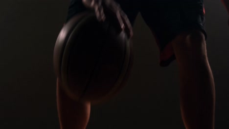 sportsman playing basketball