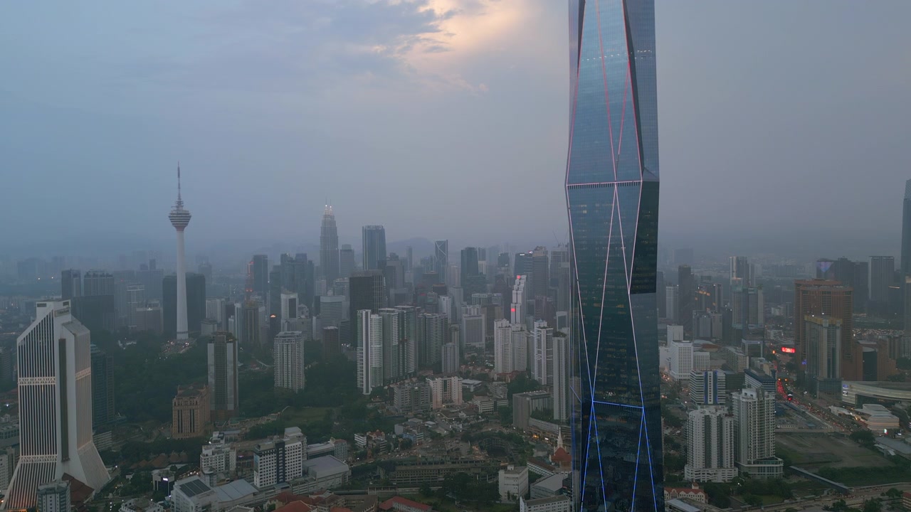 118 Merdeka Skyscraper Kuala Lumpur City Malaysia Dominating Skyline Drone Slow Rise Up Tower 4K 30FPS