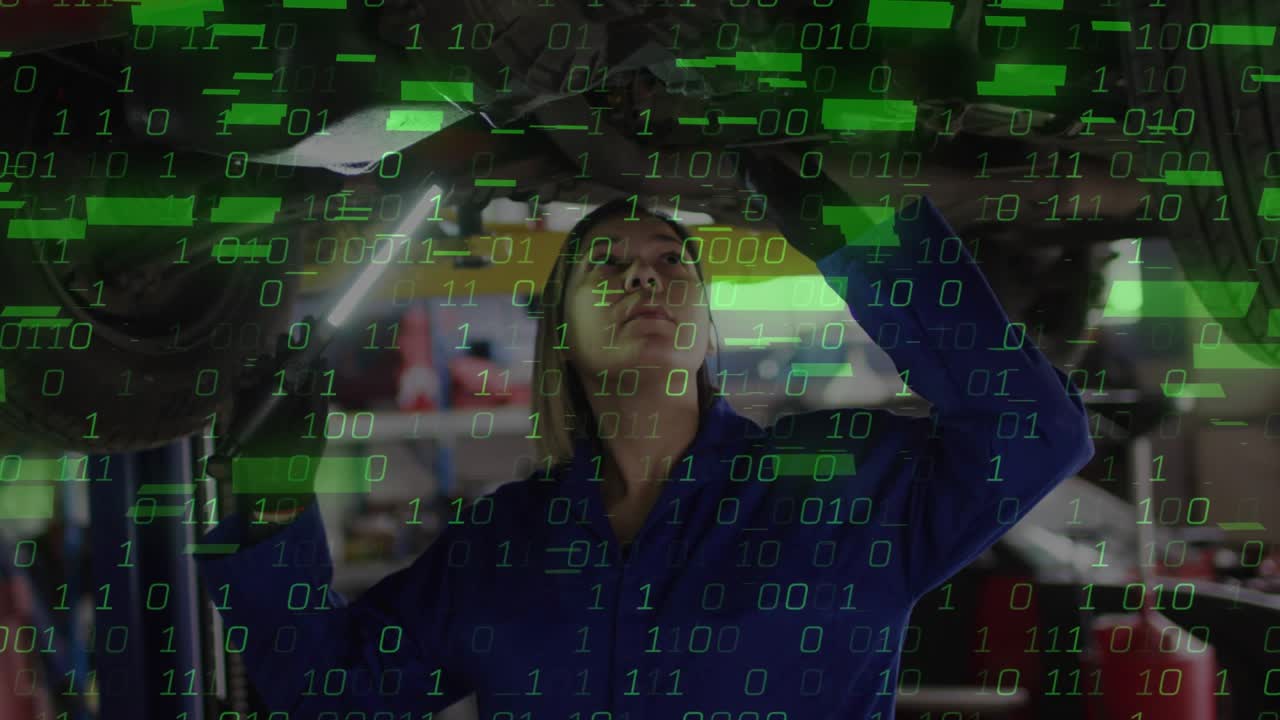 Female mechanic inspecting under vehicle by LED torch in auto shop, binary code fragments emerging