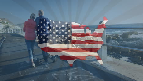 walking along coastal path, couple with usa flag animation overlay