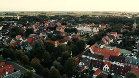 small german town with medieval houses architecture and lush greenery, dolly out