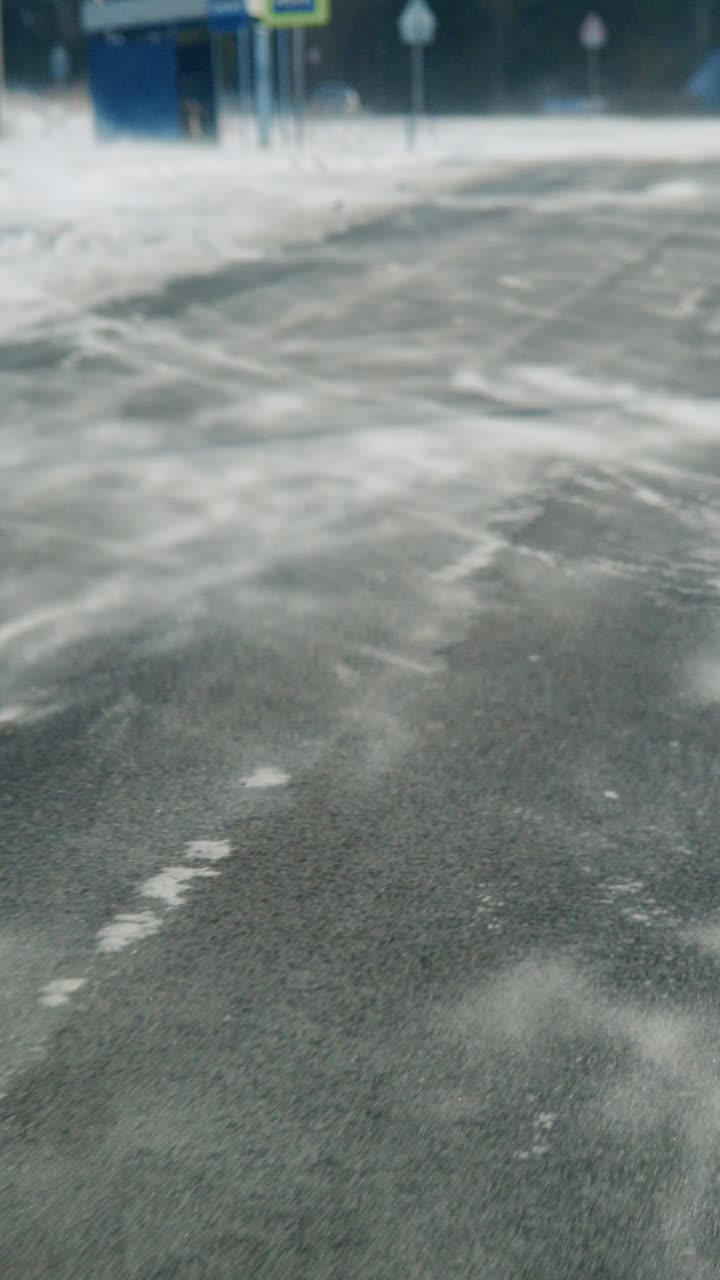 Winter sports enthusiasts enjoy ice skating on a frozen lake in a picturesque snowy landscape