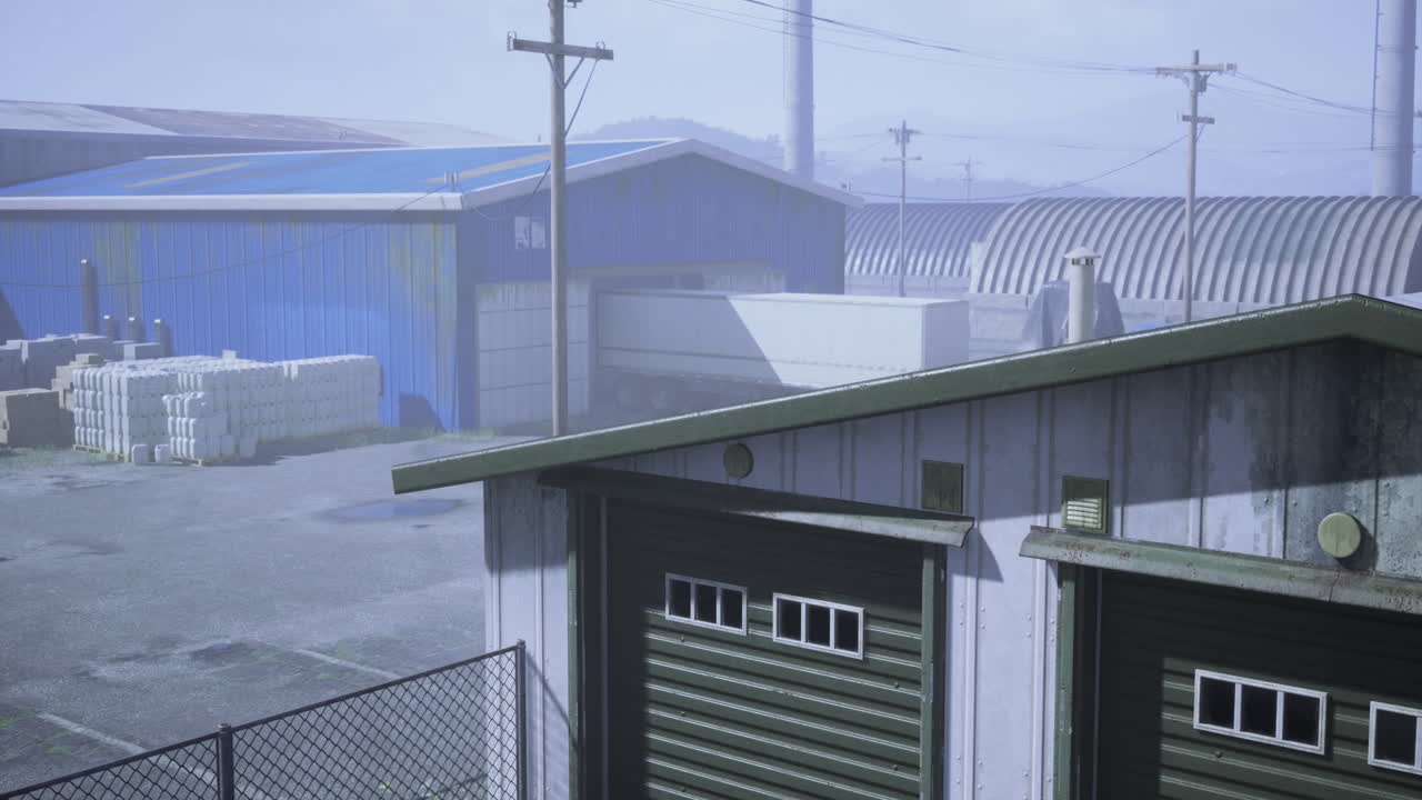 Industrial area with warehouses and storage units on a cloudy day