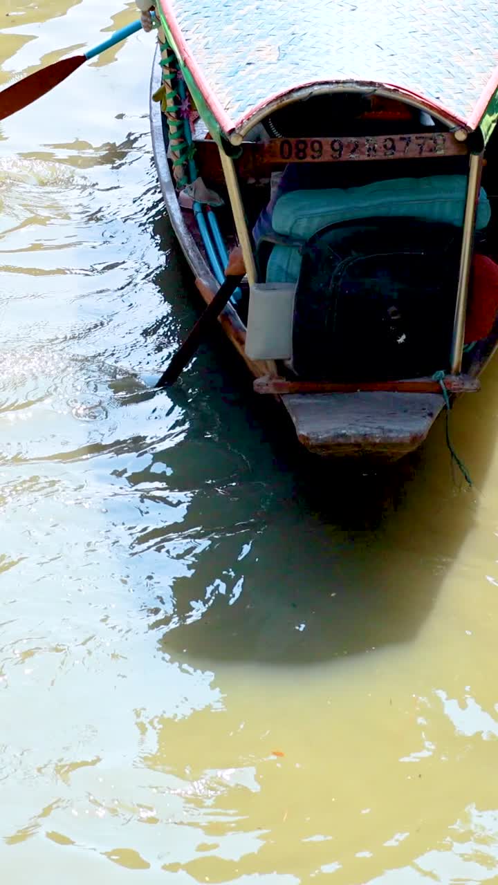 Longtail Boat on a River