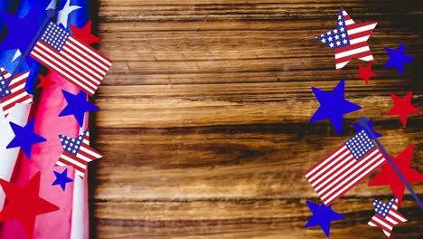 animación de estrellas y rayas sobre la bandera estadounidense en una mesa de madera