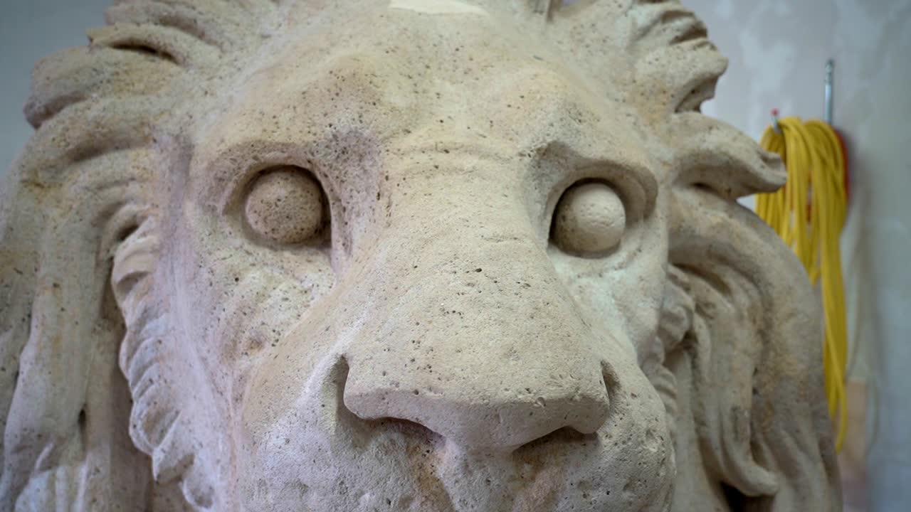 Close-up of a restored Lánchíd lion head in the studio