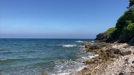 Wave-Hitting-Rocks-At-Beautiful-Island,-Ngwe-Saung-Beach,-Myanmar,-Asia