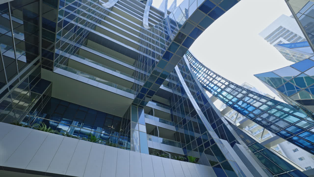 Modern Building with Glass Facade and Connecting Skybridge