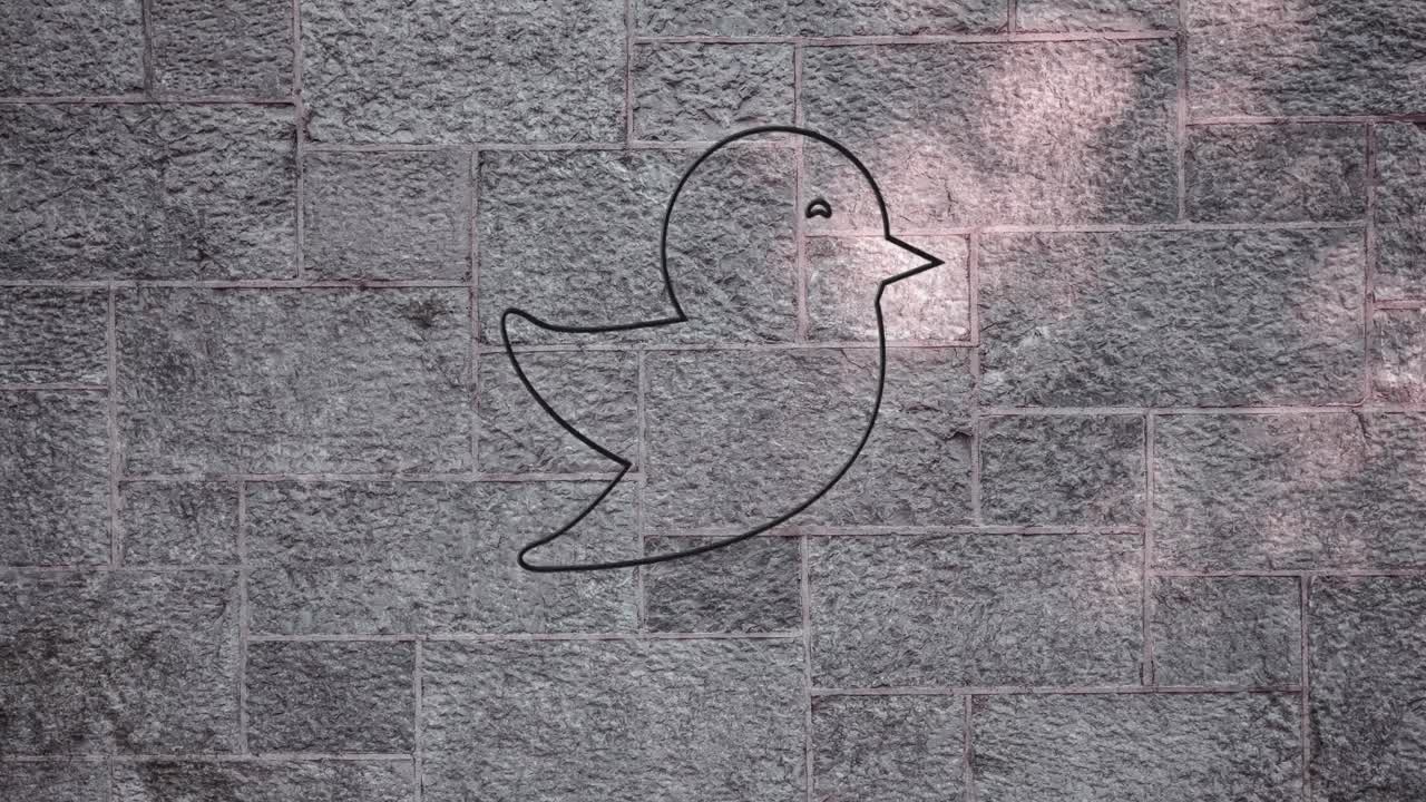 レンガの壁に光るネオンの鳥のアイコンのアニメーション