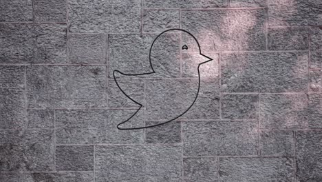 Animation-of-glowing-neon-bird-icon-on-brick-wall