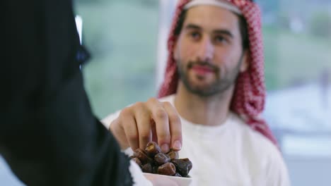 family having dates during ramadan dinner or iftar